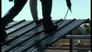 Metal Building Installation Step 19 Roof Panels [upl. by Ssepmet179]