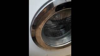 Miele washing machine f 138 error how to open the coverflooded float [upl. by Siberson]