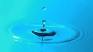 Slow Motion Water Droplet Falling Breaks Surface Tension and Makes Ripples in HD YouTube Video View [upl. by Rundgren]